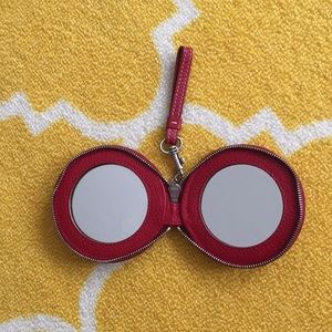 Coach mirror with a free Vera Bradley wristlet.